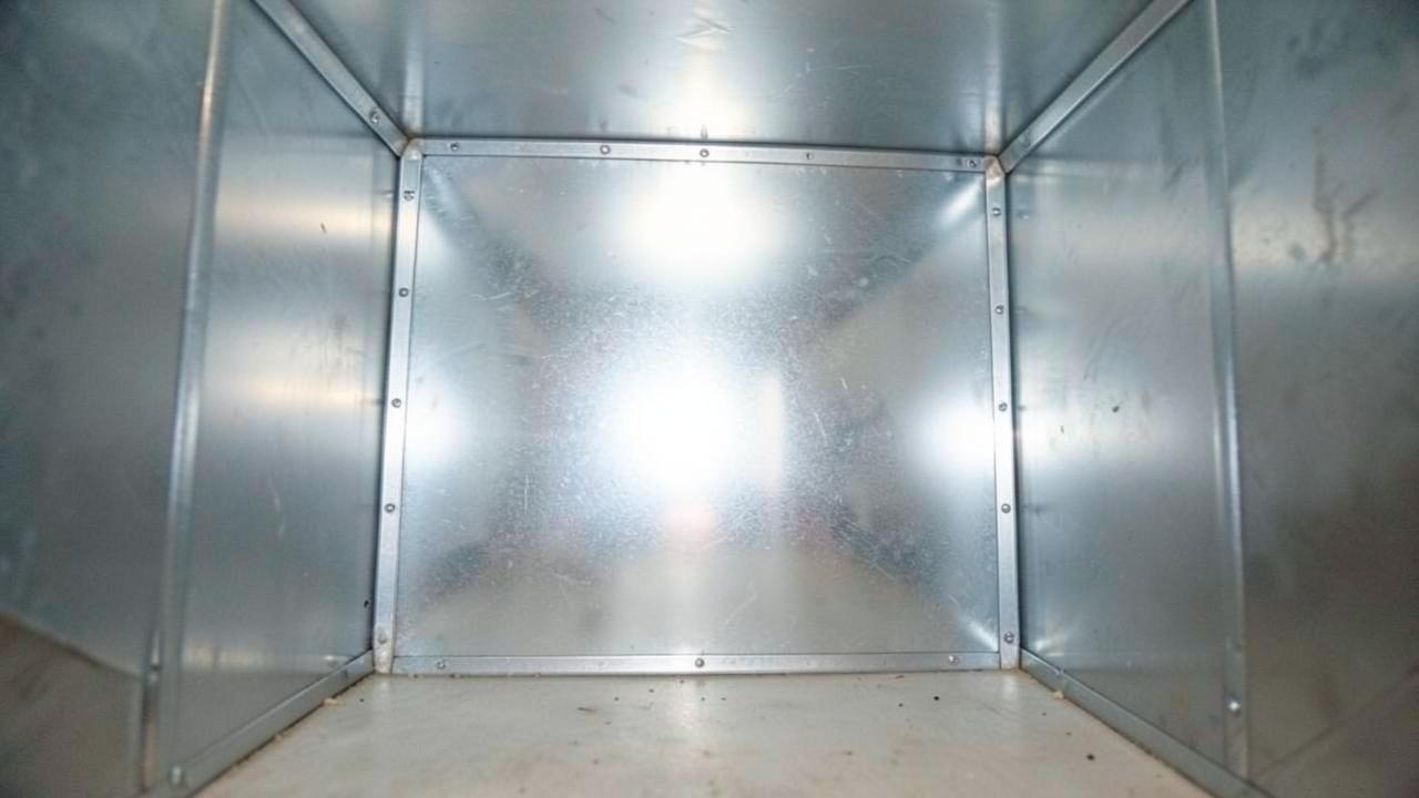 Main Trunk Line Duct Cleaning, After: The same duct interior after cleaning, showing bare clean sheet metal